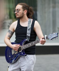 boy, busker, guitarist-8702653.jpg